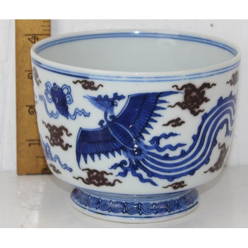 1640 - A 20th century Chinese blue & white with green highlights footed bowl decorated with Phoenix - bears... 