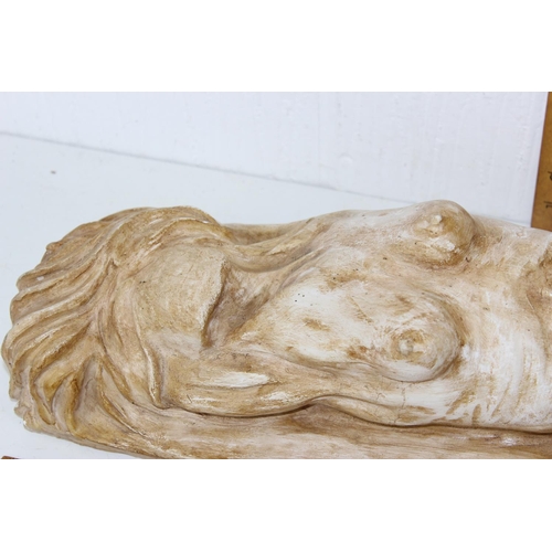 1846 - A large plaster sculpture of a recumbent nude female - signed KD 98