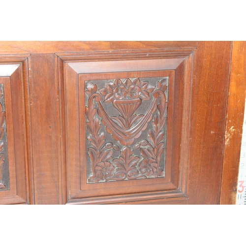 297 - A pair of antique carved wooden cupboard doors