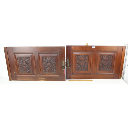 297 - A pair of antique carved wooden cupboard doors