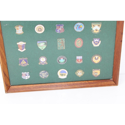 363 - Framed display of enamel bowling badges