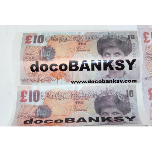 391 - A sheet of printed Di-Faced £10 notes in the manner of Banksy and 2 other similar marked docoBANKSY