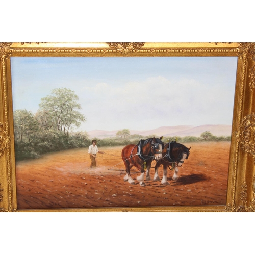 393 - Reg Brown, a pair of 20th Century oil on canvas paintings depicting Shire horses at work - both in a... 