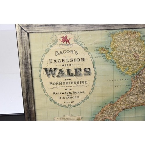 402 - Bacon's Excelsior map of Wales, framed and glazed antique map published by Bacon, 107 x 80 cm