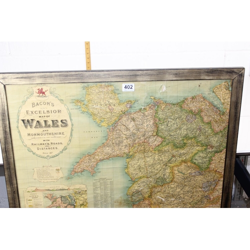 402 - Bacon's Excelsior map of Wales, framed and glazed antique map published by Bacon, 107 x 80 cm