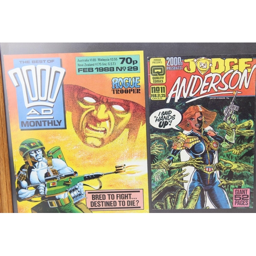 405 - Five vintage 2000 AD comic front covers, framed and glazed (103 x 37 cm)