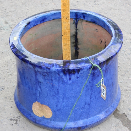 479 - A large blue drip glazed garden planter, approx 13