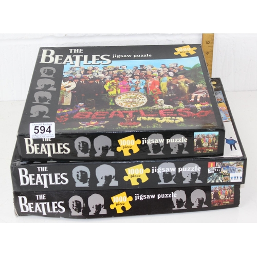 594 - 3 The Beatles jigsaw puzzles