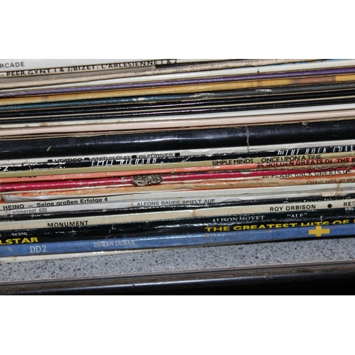 606 - Stack of assorted LP and Vinyl Records