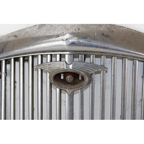 744 - A vintage chrome car radiator grill believed to be from a Wolseley