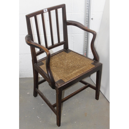 84 - Antique country elbow chair with rush-seat