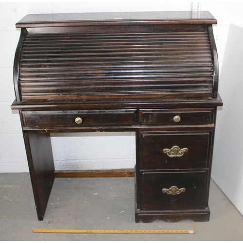 90 - A vintage roll top desk of unusually small proportions