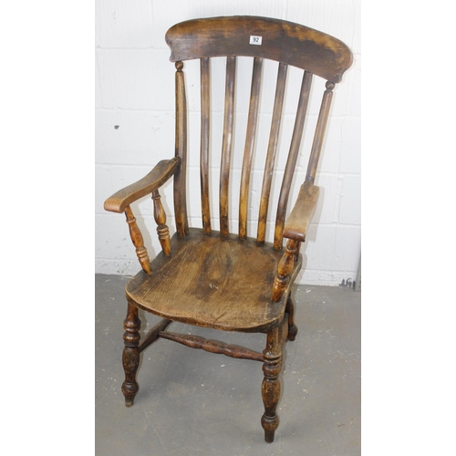 92 - A 19th century high slat backed farmhouse Windsor armchair