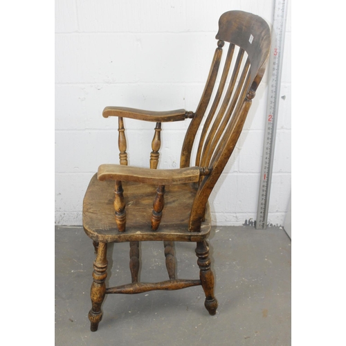 92 - A 19th century high slat backed farmhouse Windsor armchair