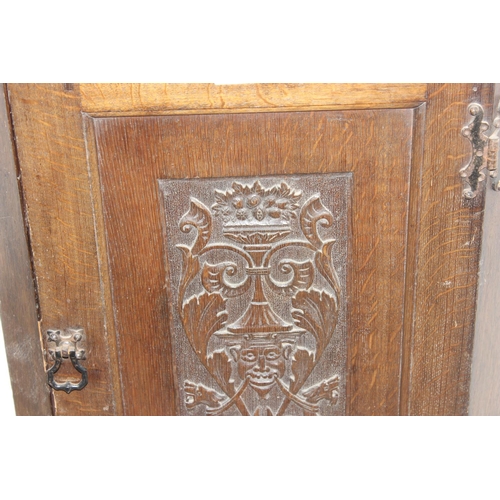 96 - Georgian carved Oak hanging corner cabinet