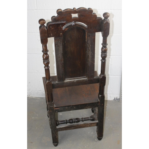 97 - Antique Oak high-backed carved chair believed to be 17th Century