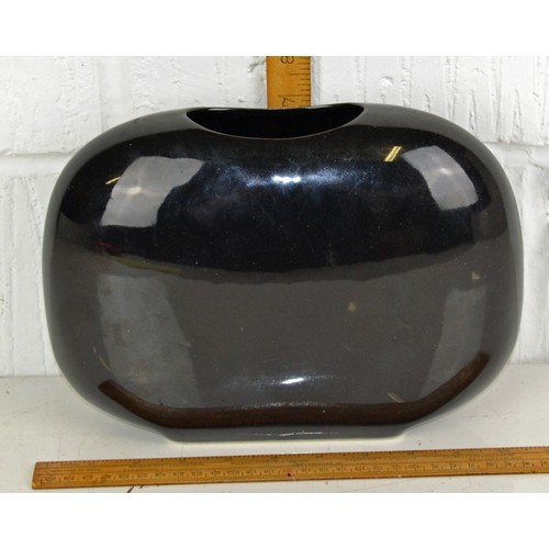 1725 - A retro black pottery vase with abstract design