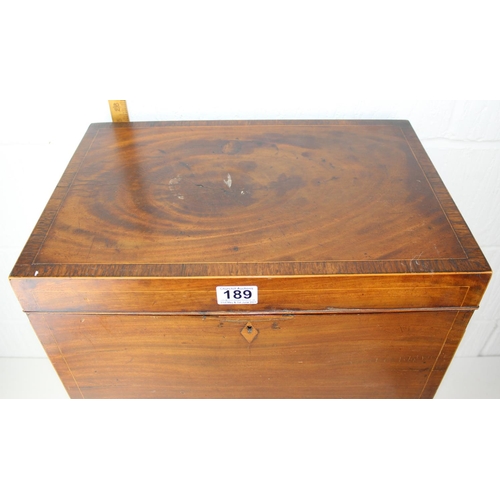 189 - An antique Mahogany cellarette type box on thin legs and lion mask ring handles, later converted to ... 