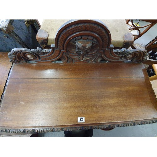 22 - A Victorian Gothic Revival period hall table with carved details in high relief