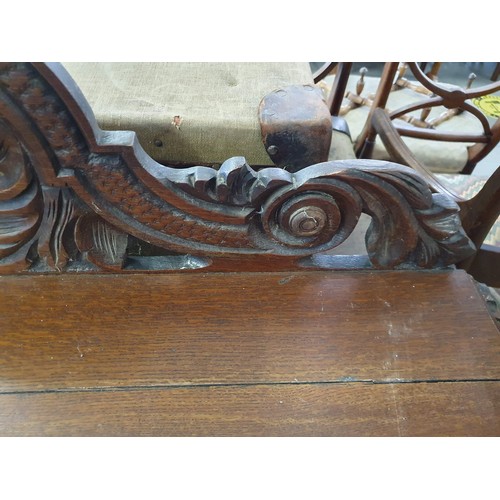 22 - A Victorian Gothic Revival period hall table with carved details in high relief