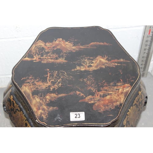 23 - An early 20th century Oriental black lacquer jardiniere stand with painted decoration