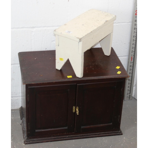 25 - A rustic white painted stool and a wooden cabinet