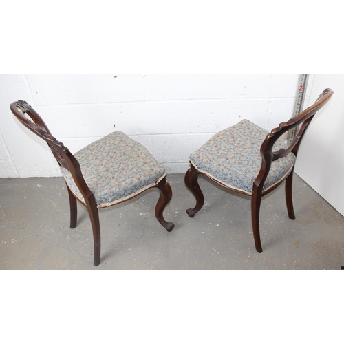 26 - A pair of Victorian Balloon backed dining chairs with carved details