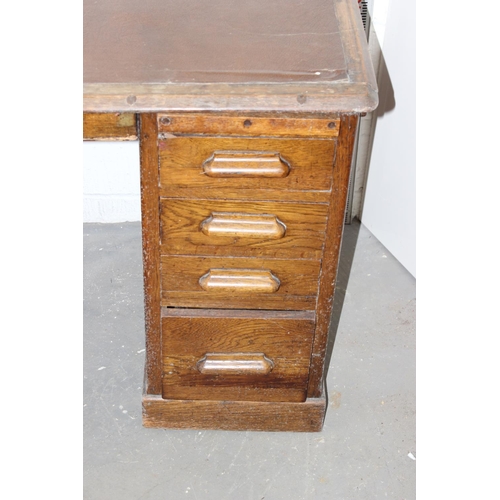 5 - An Art Deco period oak pedestal desk