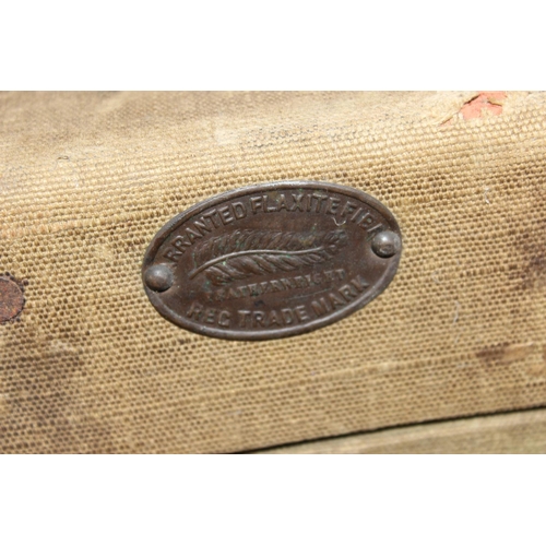 190 - A set of 3 matched travelling trunks/ suitcases marked 