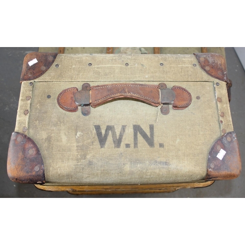 190 - A set of 3 matched travelling trunks/ suitcases marked 
