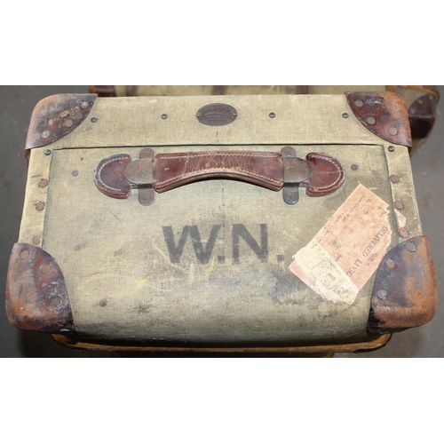 190 - A set of 3 matched travelling trunks/ suitcases marked 