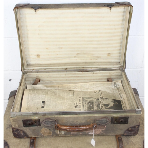 190 - A set of 3 matched travelling trunks/ suitcases marked 