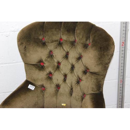 187 - A vintage button back chair with carved wooden legs