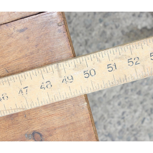 13 - A vintage stripped pine kitchen table