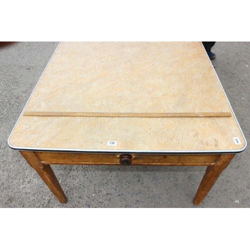 136 - A large Victorian pine kitchen table with 2 drawers and a later formica top