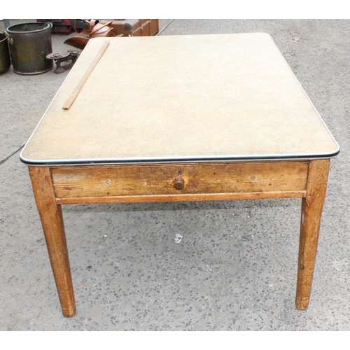 136 - A large Victorian pine kitchen table with 2 drawers and a later formica top