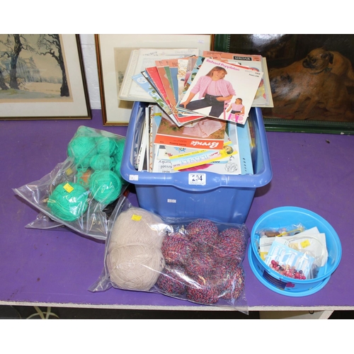 204 - Collection of knitting patterns, embroidery patterns and books, knitting needles, wool and additiona... 