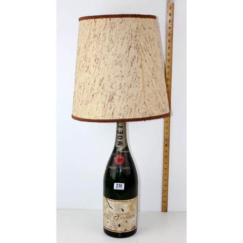 230 - A large vintage 1953 Moet champagne bottle later converted into a lamp