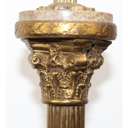 233 - A vintage gilt metal and marble column standard lamp