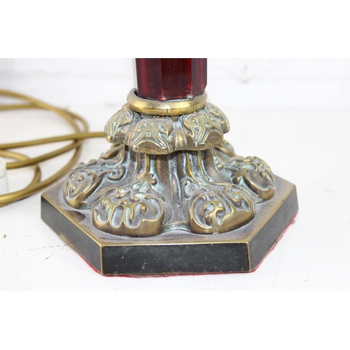 245 - An impressive brass and ruby glass table lamp converted from an oil lamp