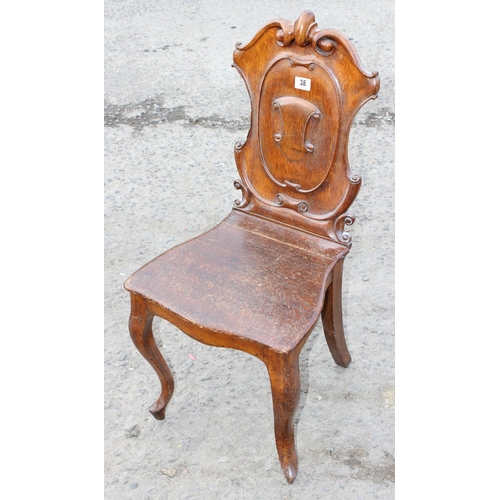 38 - Victorian carved oak hall chair