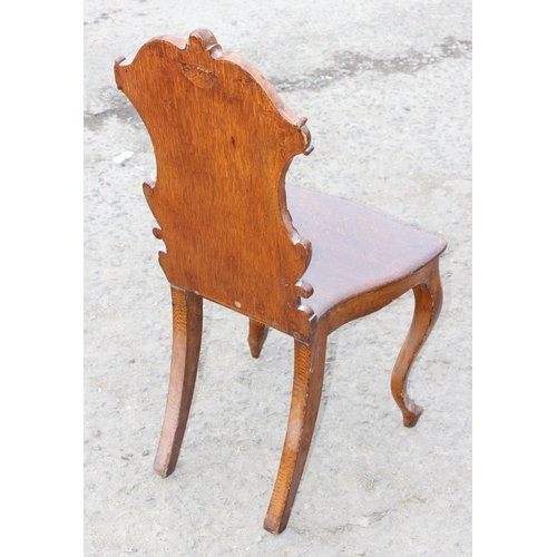 38 - Victorian carved oak hall chair