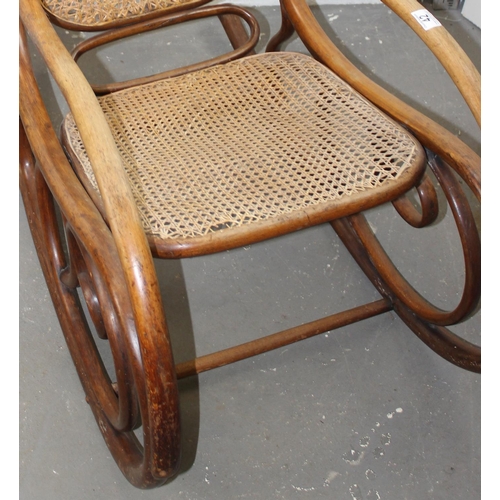 42 - An early 20th century bentwood rocking chair with Bergere seat in the manner of Thonet