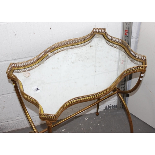 46 - A vintage style gilt metal table with mirror glass top