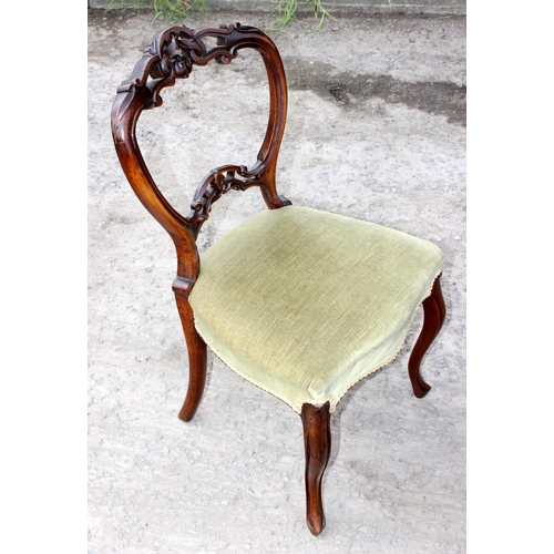 6 - A set of 4 Victorian Balloon back dining chairs with stuffed seats