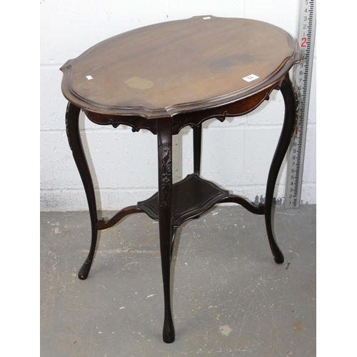 64 - An Edwardian side table with carved details