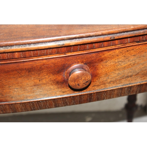 22 - A 19th century side table with drawer and turned wooden handles