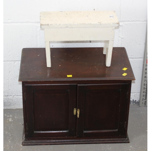 25 - A rustic white painted stool and a wooden cabinet