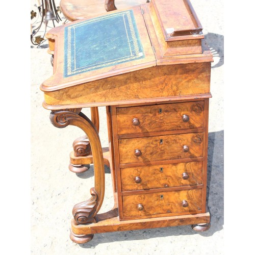 85 - A Victorian walnut Davenport desk with leather top and Satinwood interior