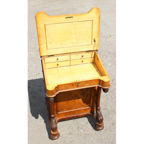 85 - A Victorian walnut Davenport desk with leather top and Satinwood interior